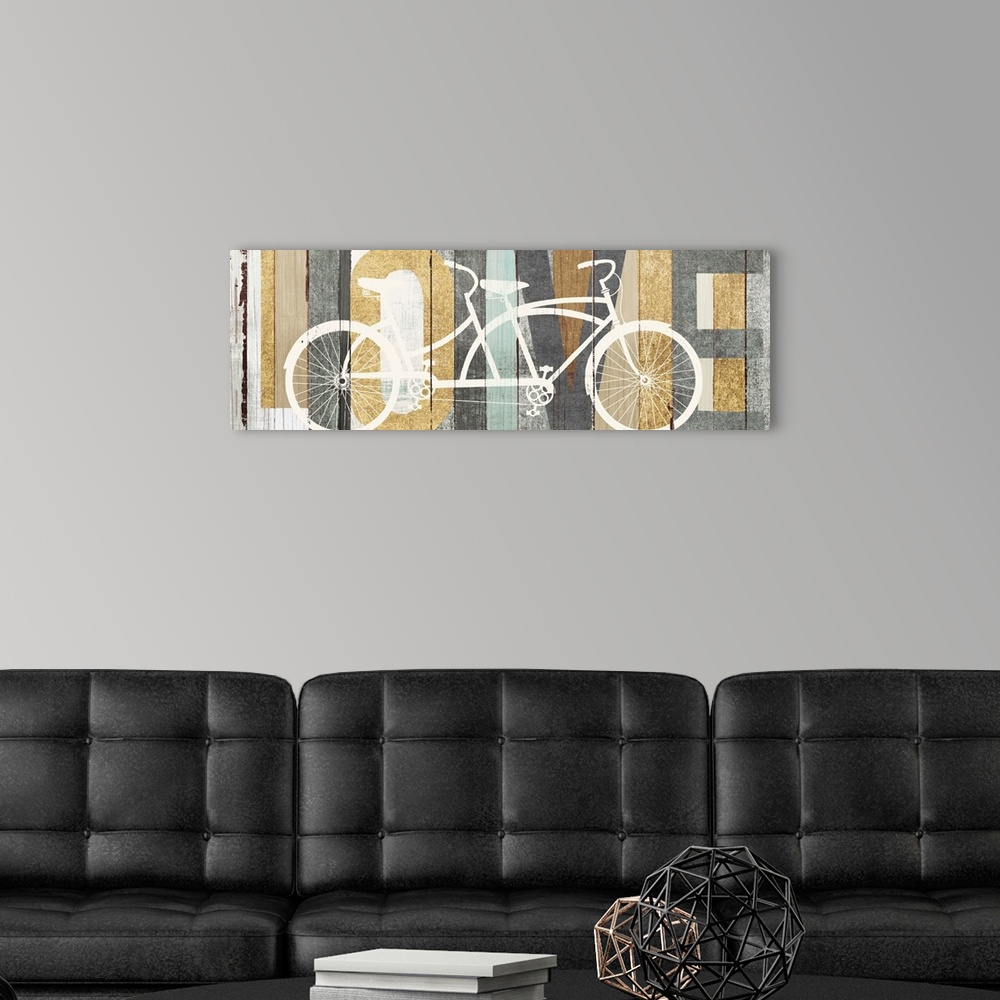 A modern room featuring "LOVE" painted on a wood paneled background with a white silhouette of a tandem bicycle on top.