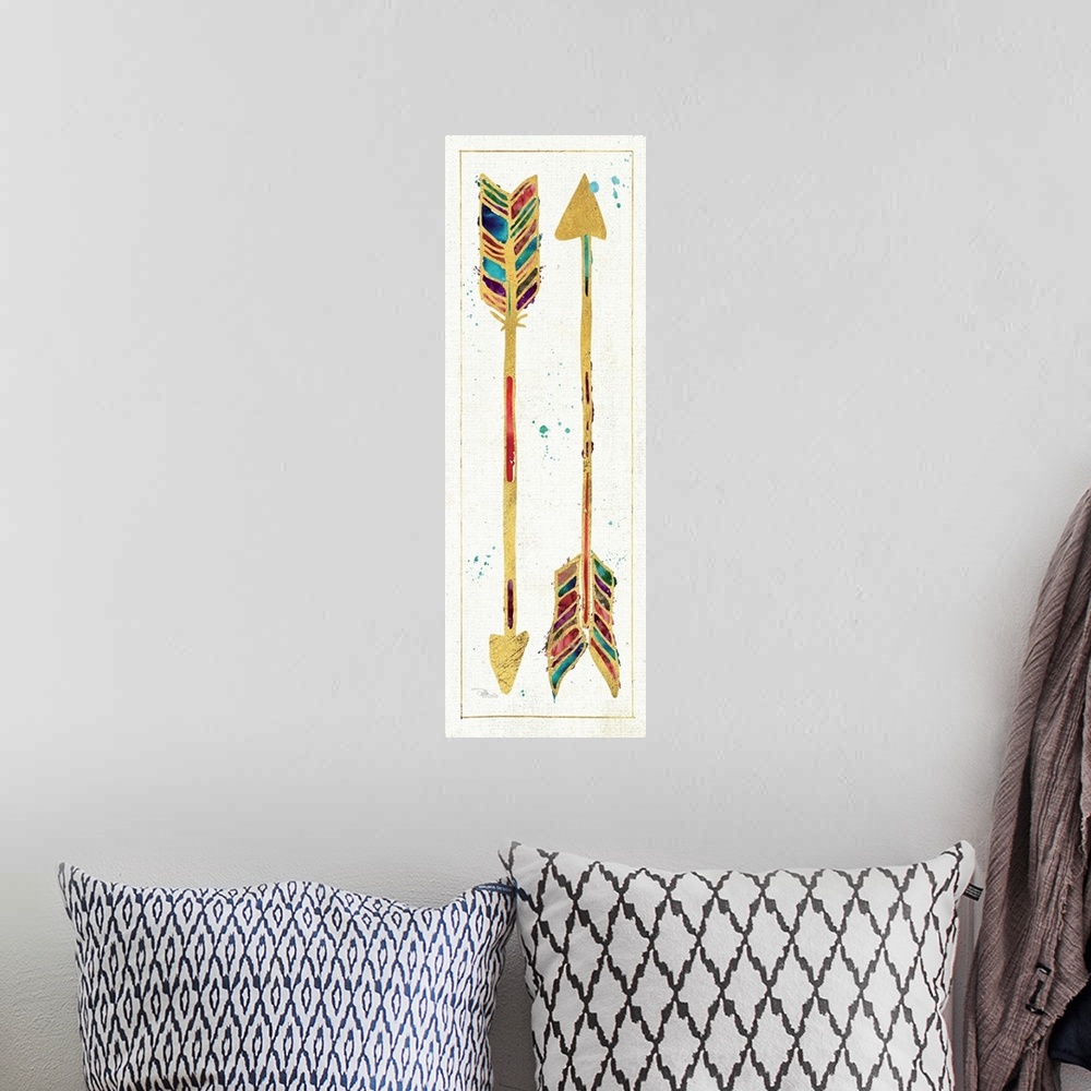 A bohemian room featuring Two colorful arrows outlined in gold.