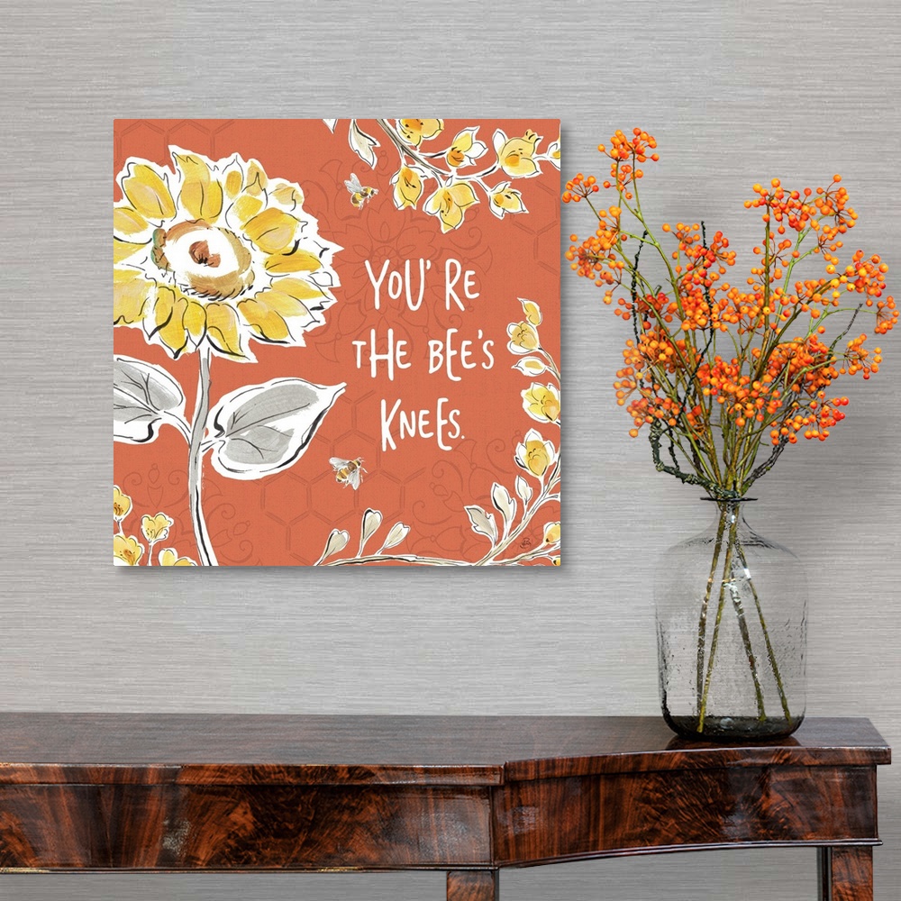 A traditional room featuring "You're The Bee's Knees" written in white on a dark coral colored background with illustrations o...