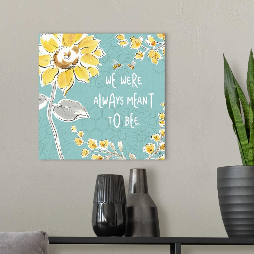 A modern room featuring "We Were Always Meant To Be" written in white on a blue background with illustrations of yellow f...
