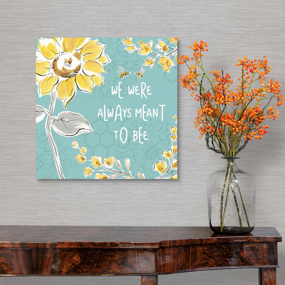 A traditional room featuring "We Were Always Meant To Be" written in white on a blue background with illustrations of yellow f...