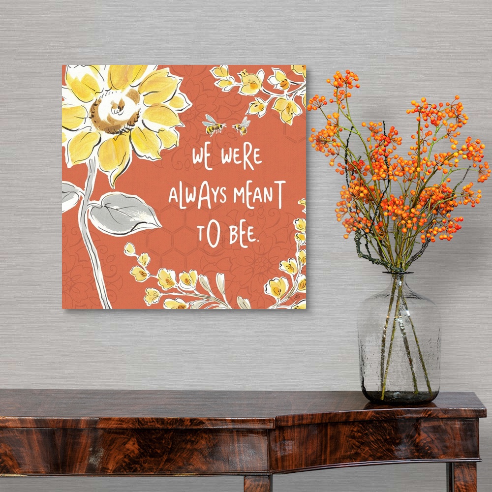 A traditional room featuring "We Were Always Meant To Be" written in white on a dark coral colored background with illustratio...