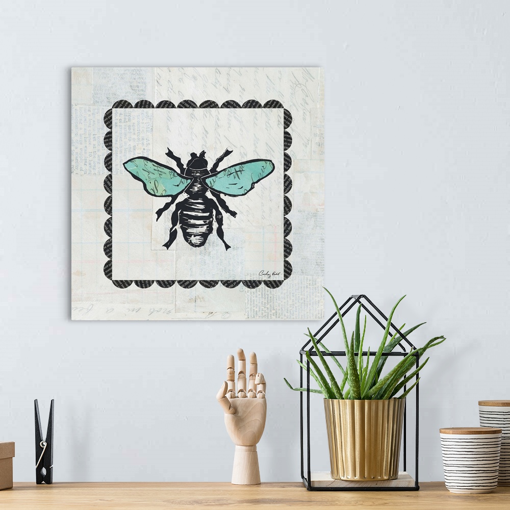 A bohemian room featuring Contemporary decorative artwork of a bee surrounded by a square border design against a gray back...
