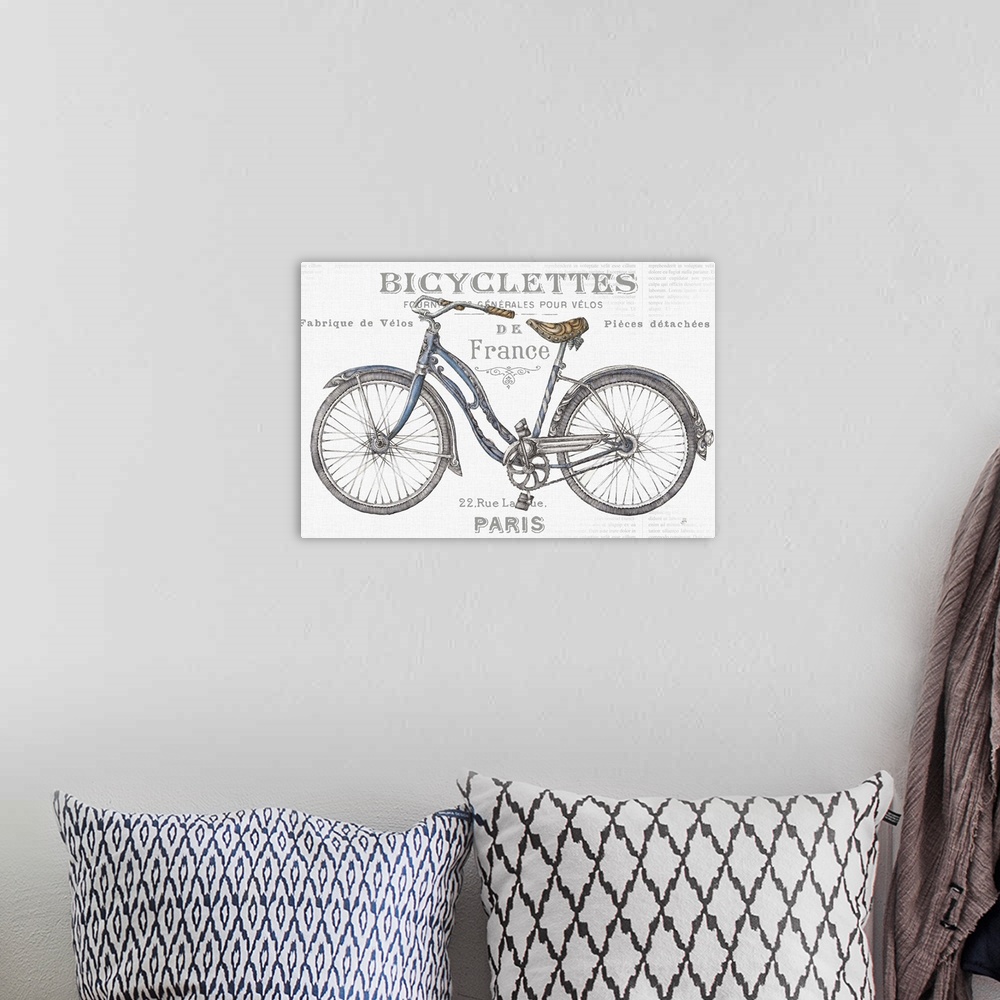 A bohemian room featuring French vintage style bicycle advertisement with French text.