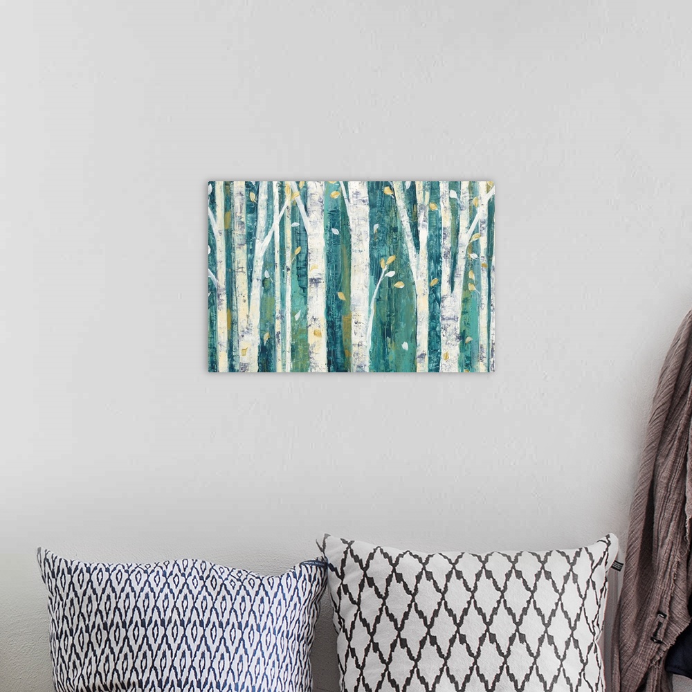 A bohemian room featuring Contemporary artwork of white birch trees in a teal forest.