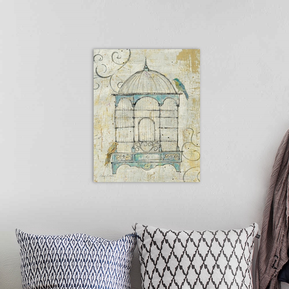 A bohemian room featuring Decorative artwork perfect for the home of an antique bird cage that has two birds sitting outsid...