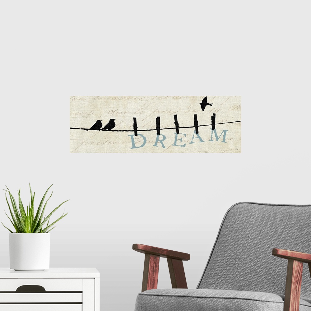 A modern room featuring Contemporary artwork of silhouetted birds on a wire with the word "Dream" hanging from the line.