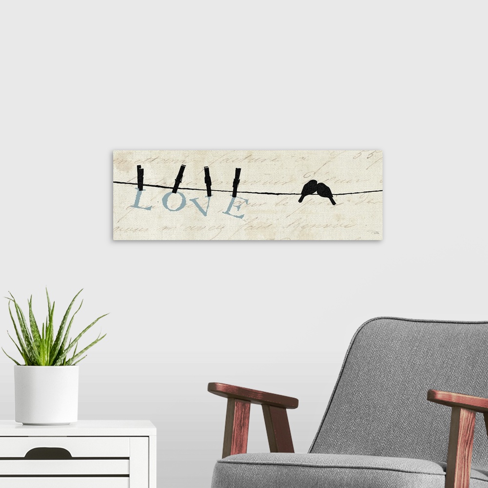 A modern room featuring Contemporary artwork of silhouetted birds on a wire with the word "Love" hanging from the line.