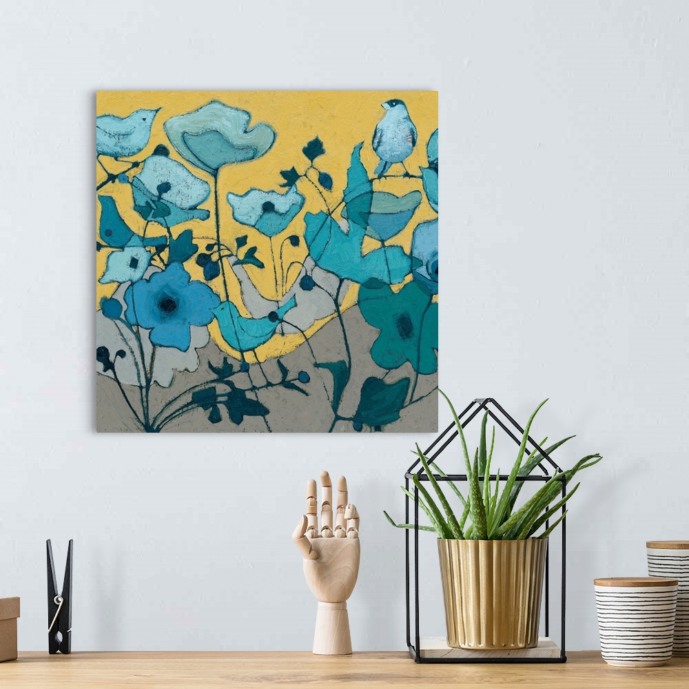 A bohemian room featuring Painting of a bird hiding among blue flowers.
