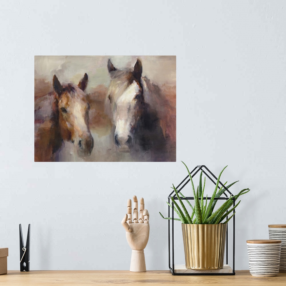 A bohemian room featuring Contemporary artwork of a portrait of two horses surrounded by warm earthy tones.
