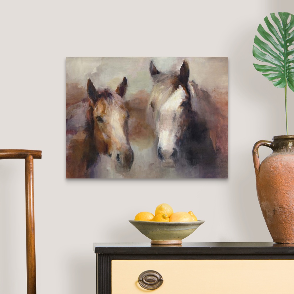 A traditional room featuring Contemporary artwork of a portrait of two horses surrounded by warm earthy tones.