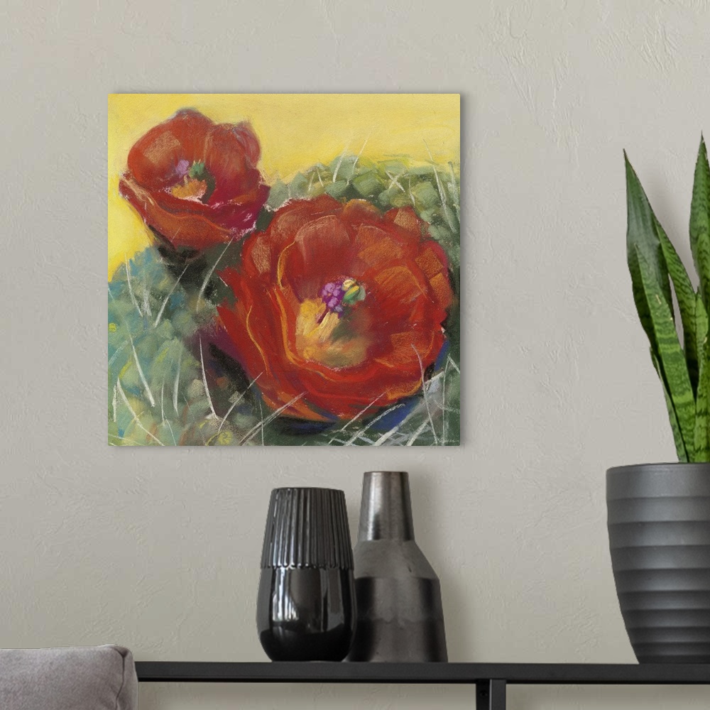 A modern room featuring A square contemporary painting of red blooms on a cactus with a yellow background.