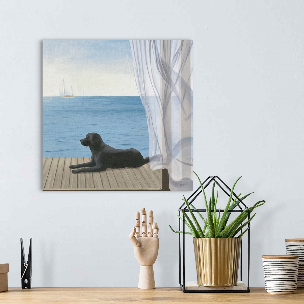 A bohemian room featuring Coastal artwork of a black lab laying on a deck overlooking the sea.