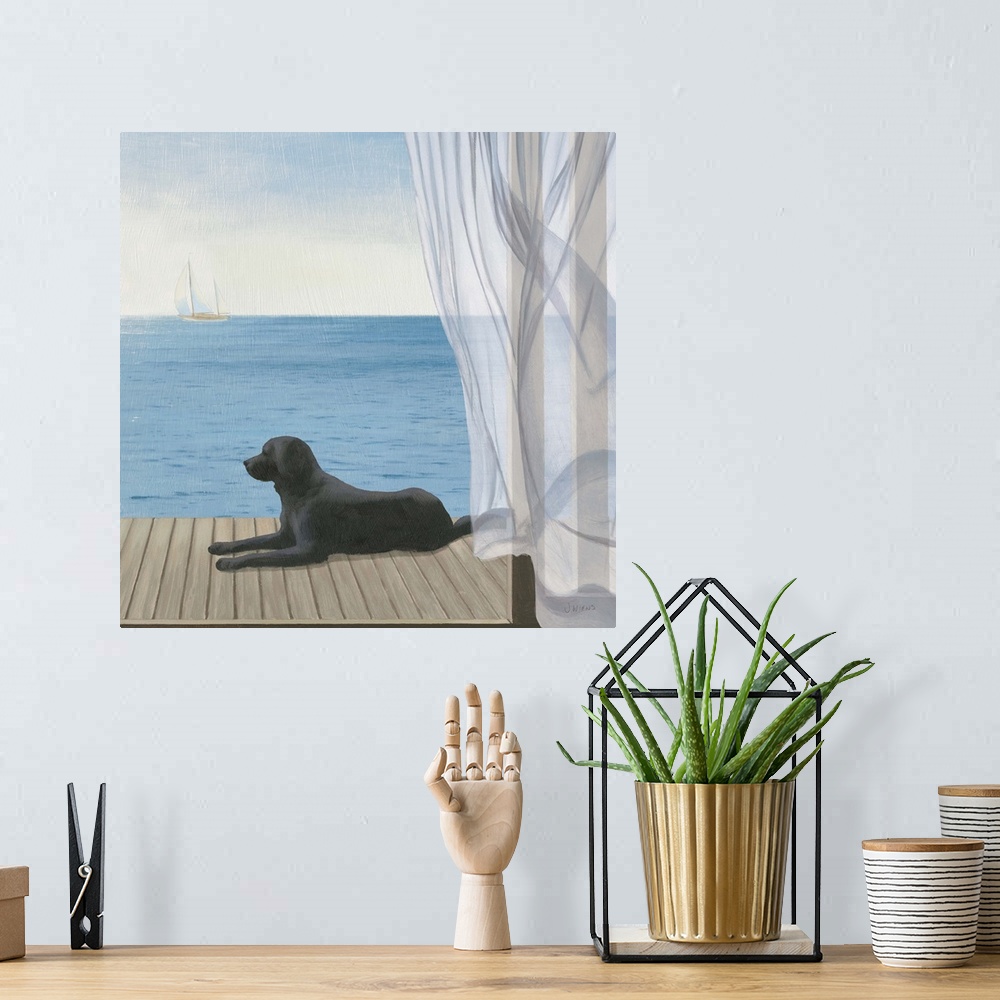 A bohemian room featuring Coastal artwork of a black lab laying on a deck overlooking the sea.
