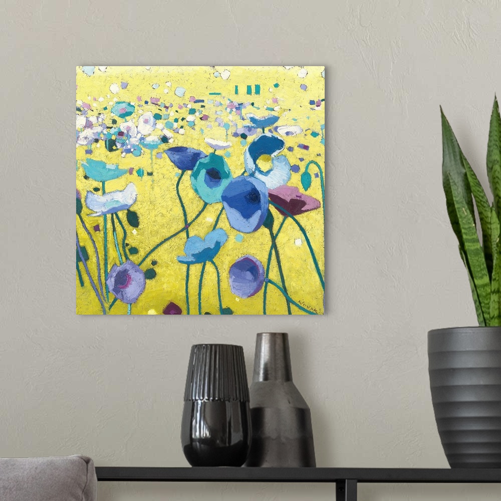 A modern room featuring Contemporary artwork of a field of blue poppies with long stems.