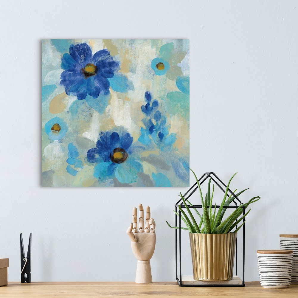 A bohemian room featuring Contemporary square painting of blue flowers on a neutral background.