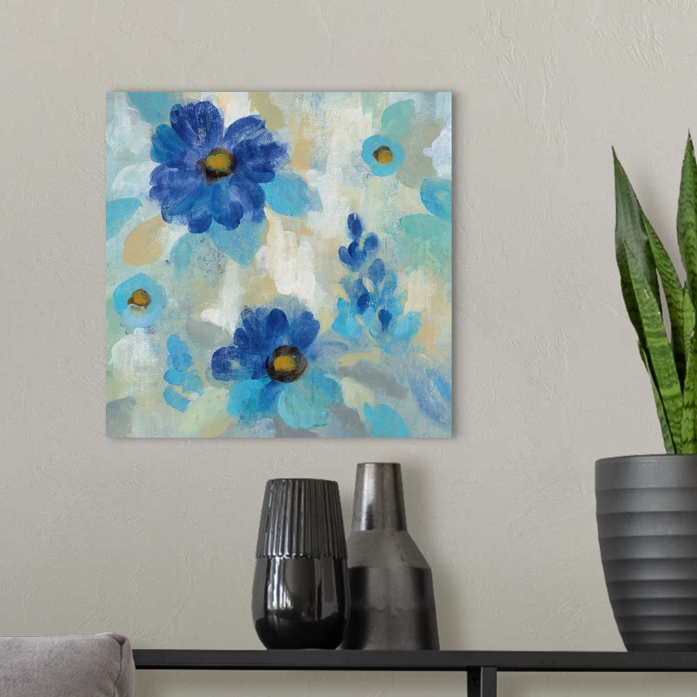 A modern room featuring Contemporary square painting of blue flowers on a neutral background.