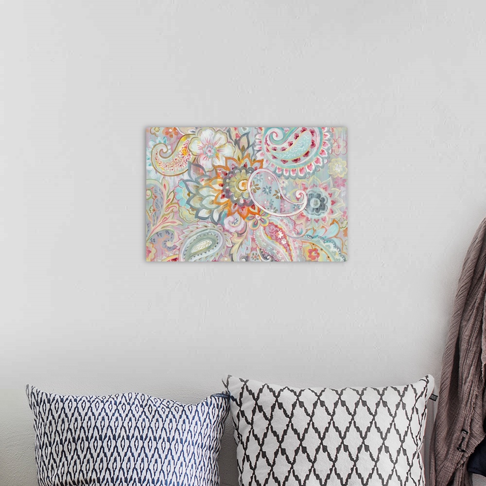 A bohemian room featuring Bohemian abstract painting with busy, colorful floral and paisley designs.
