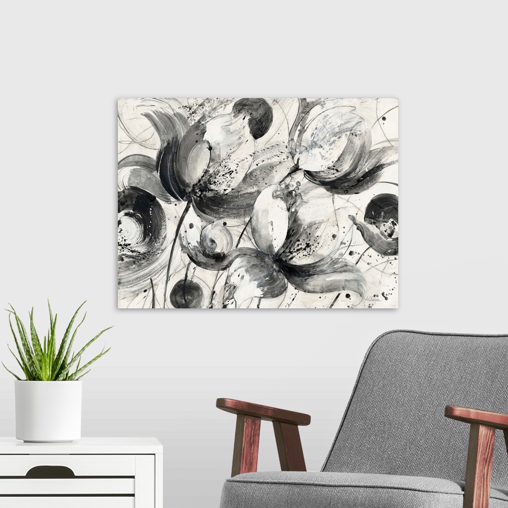 A modern room featuring Black and white abstract watercolor painting of flowers.