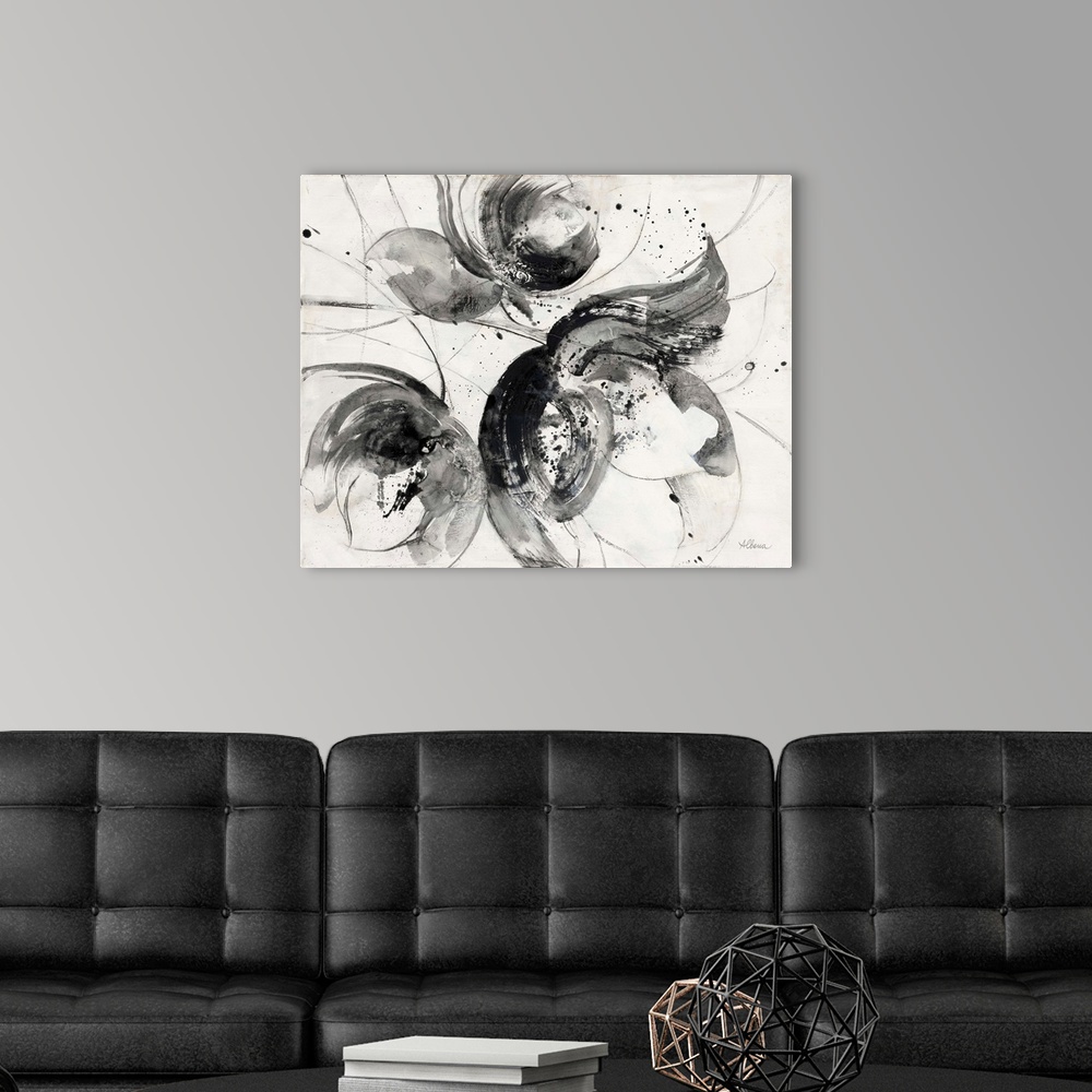 A modern room featuring Black and white abstract watercolor painting of flowers.