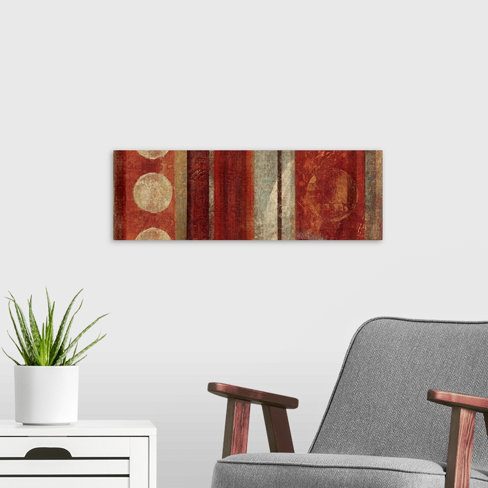 A modern room featuring Abstract painting with circles against vertical stripes in earthy tones.