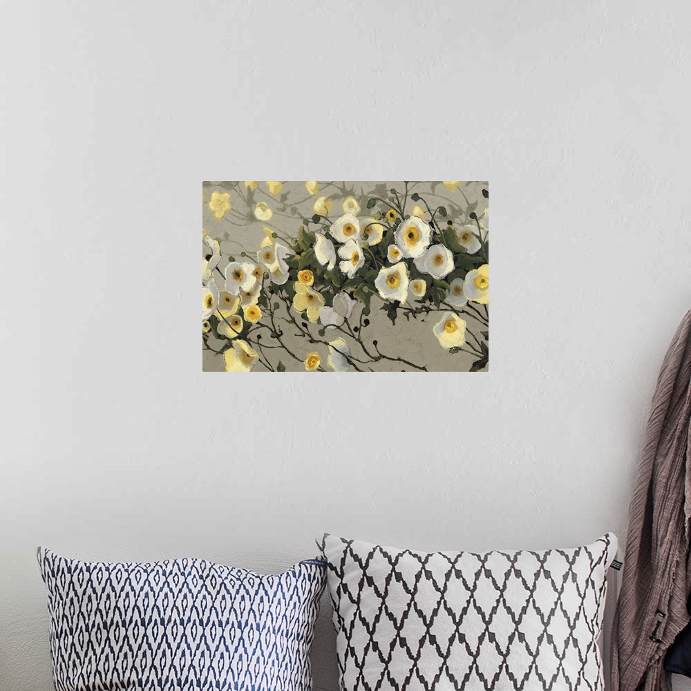 A bohemian room featuring Contemporary painting of garden flowers in yellow and white against a putty gray background.
