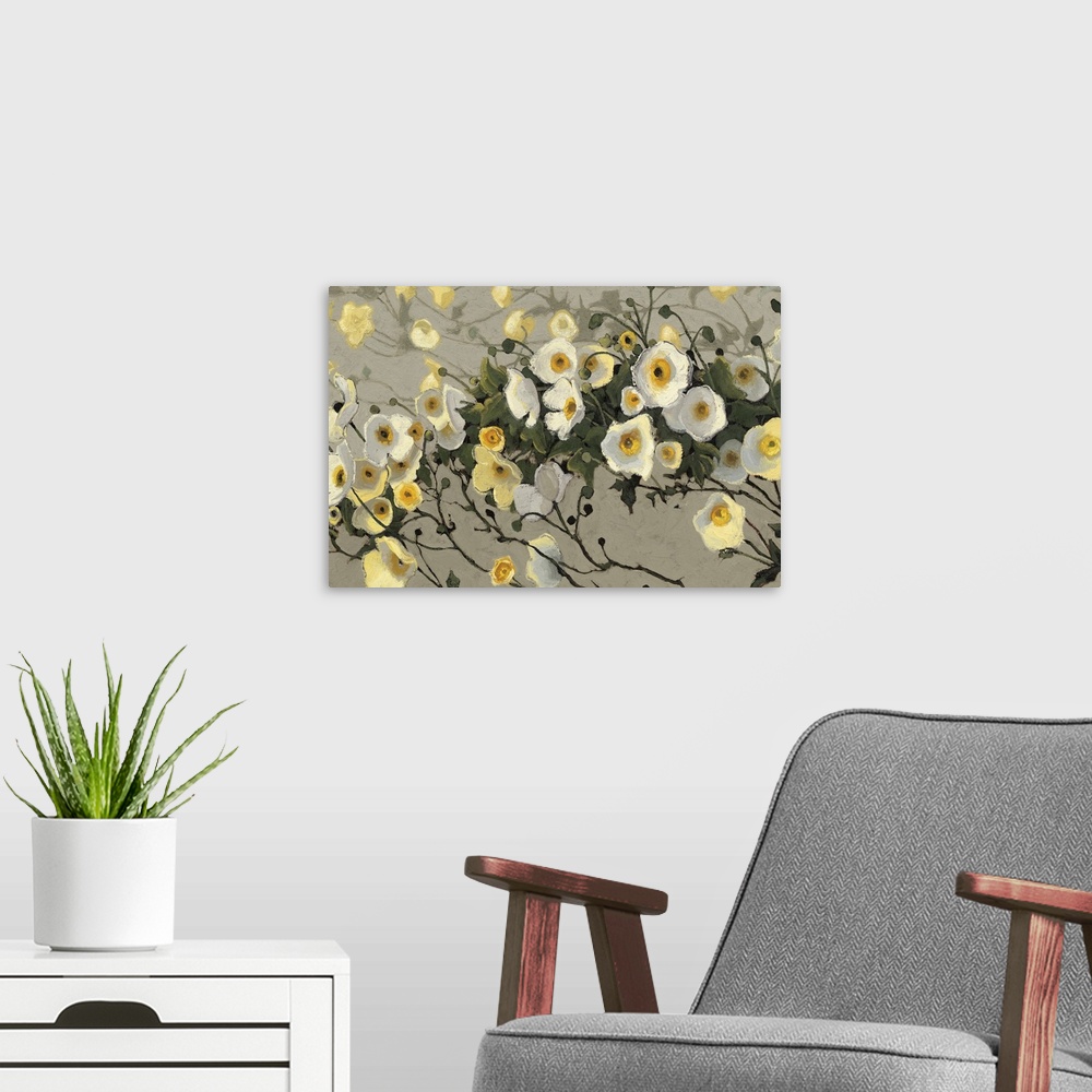 A modern room featuring Contemporary painting of garden flowers in yellow and white against a putty gray background.