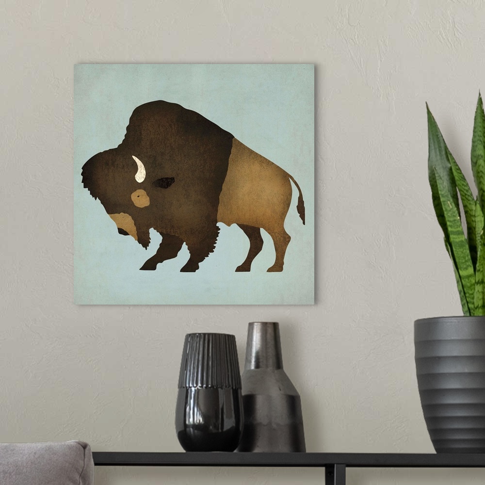A modern room featuring Artwork of a furry buffalo with white horns on a pale blue background.