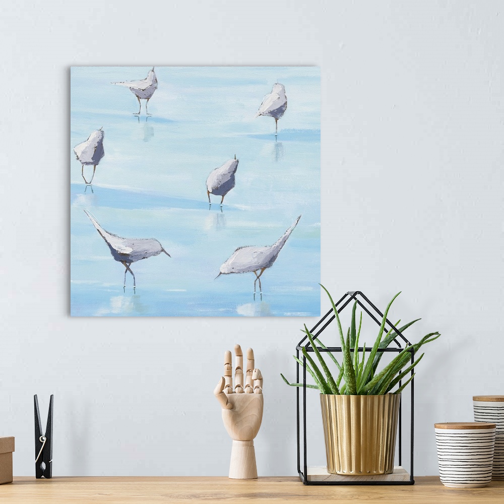 A bohemian room featuring Square abstract painting of six shorebirds exploring the shallow ocean waters.