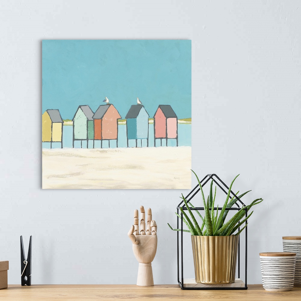 A bohemian room featuring Decorative artwork of colorful sea shacks at the beach with two seagulls.
