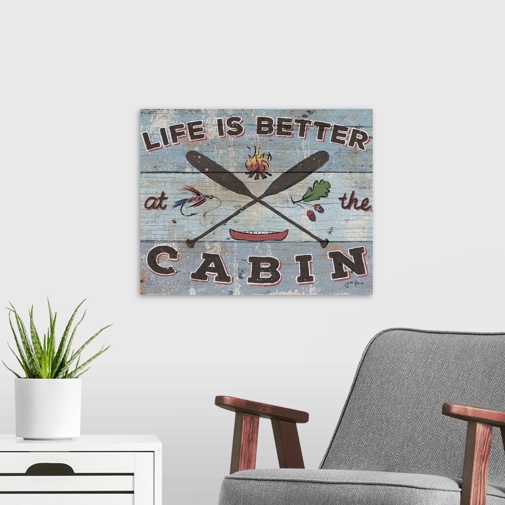 A modern room featuring Vintage style image on a wooden board background of crossed paddles and "Life is Better at the Ca...