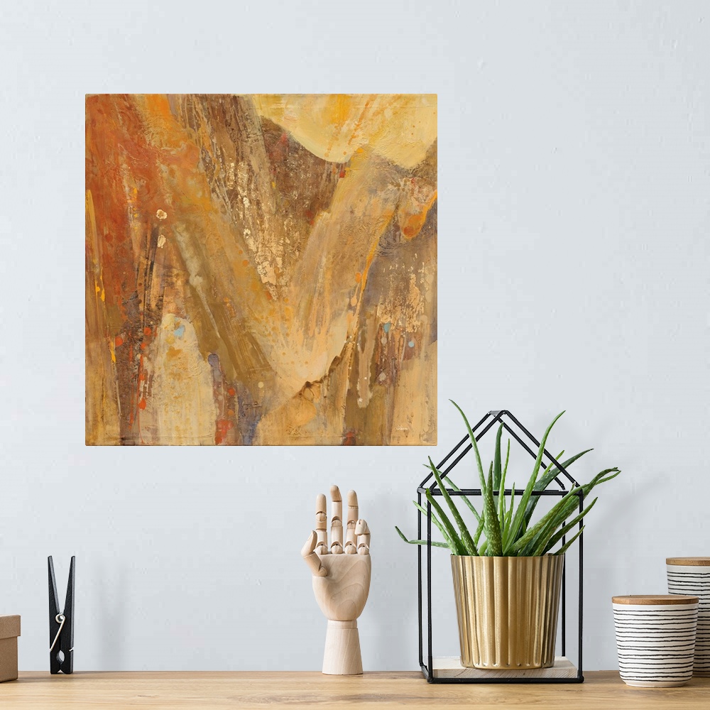 A bohemian room featuring Square abstract painting with brown, orange, cream, and yellow hues resembling a canyon with smal...