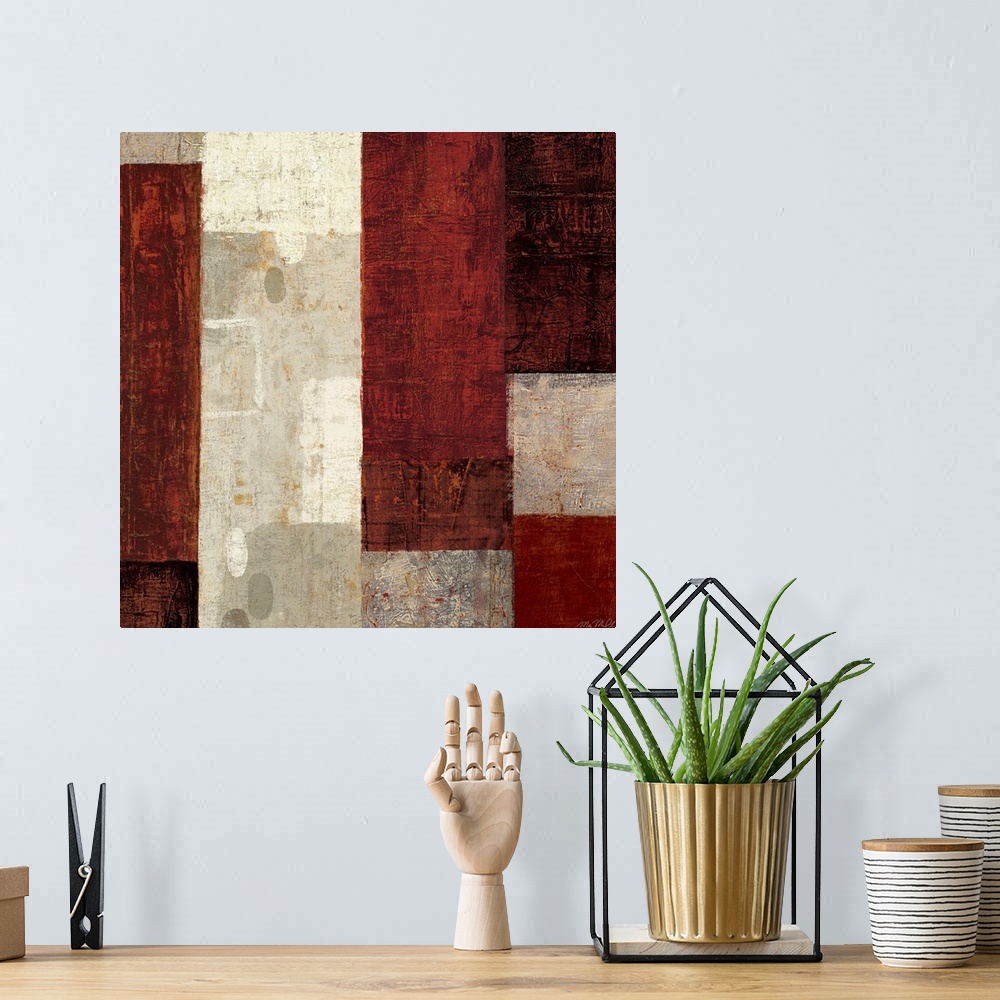 A bohemian room featuring Contemporary abstract painting of squares and rectangles arranged vertically.  The shapes varying...