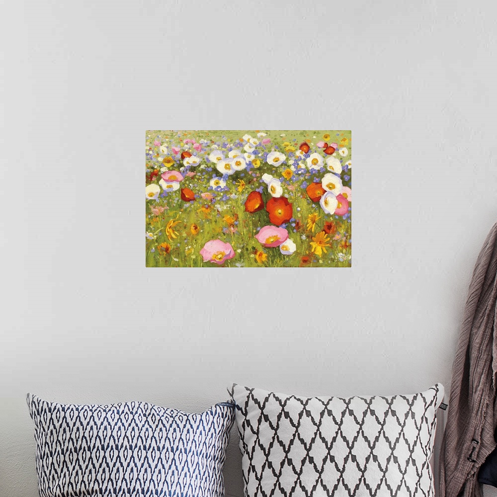 A bohemian room featuring Contemporary artwork of a field of blooming flowers in pink, red, and white.