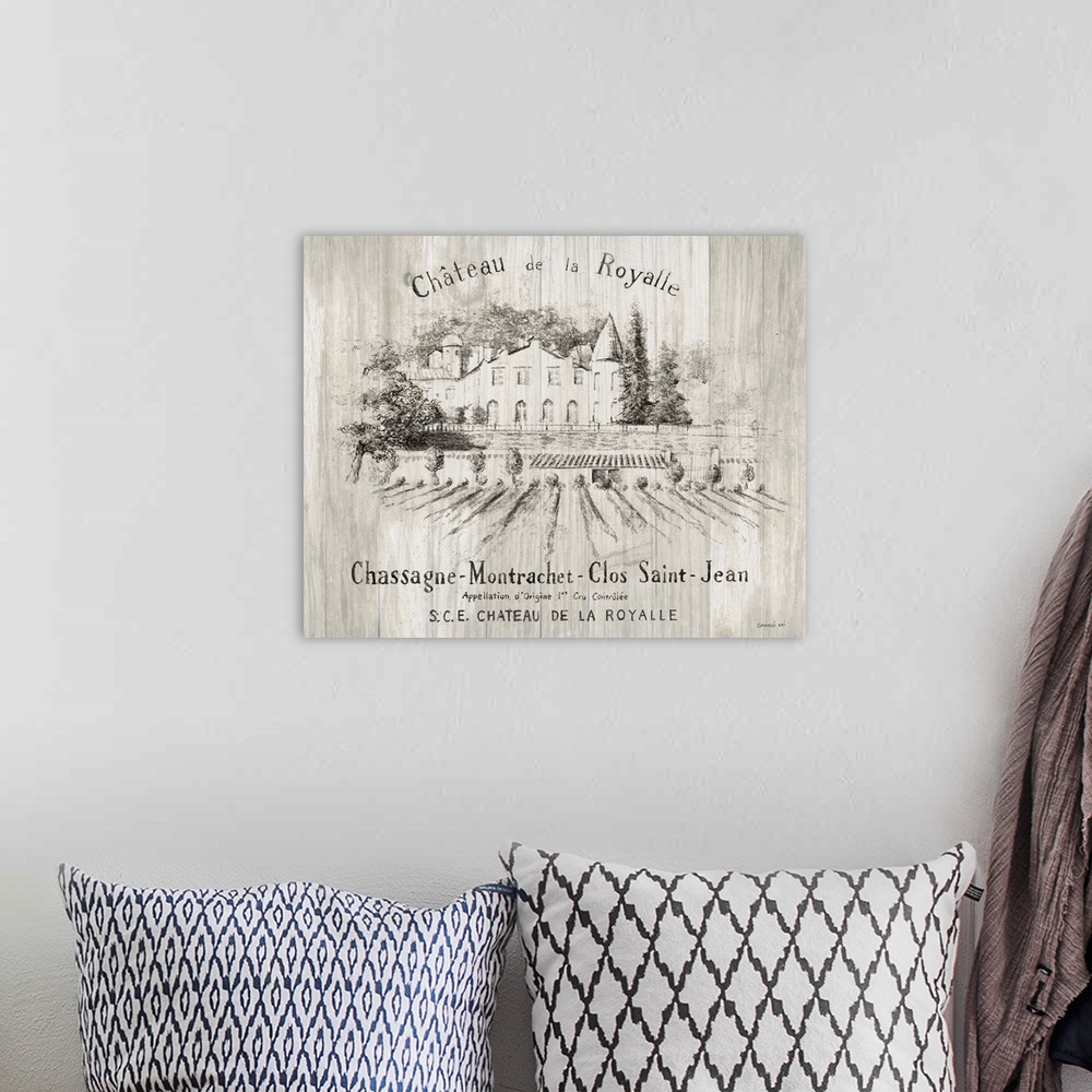 A bohemian room featuring Gray and white sketch of the Chateau Royalle vineyard on wood panels.