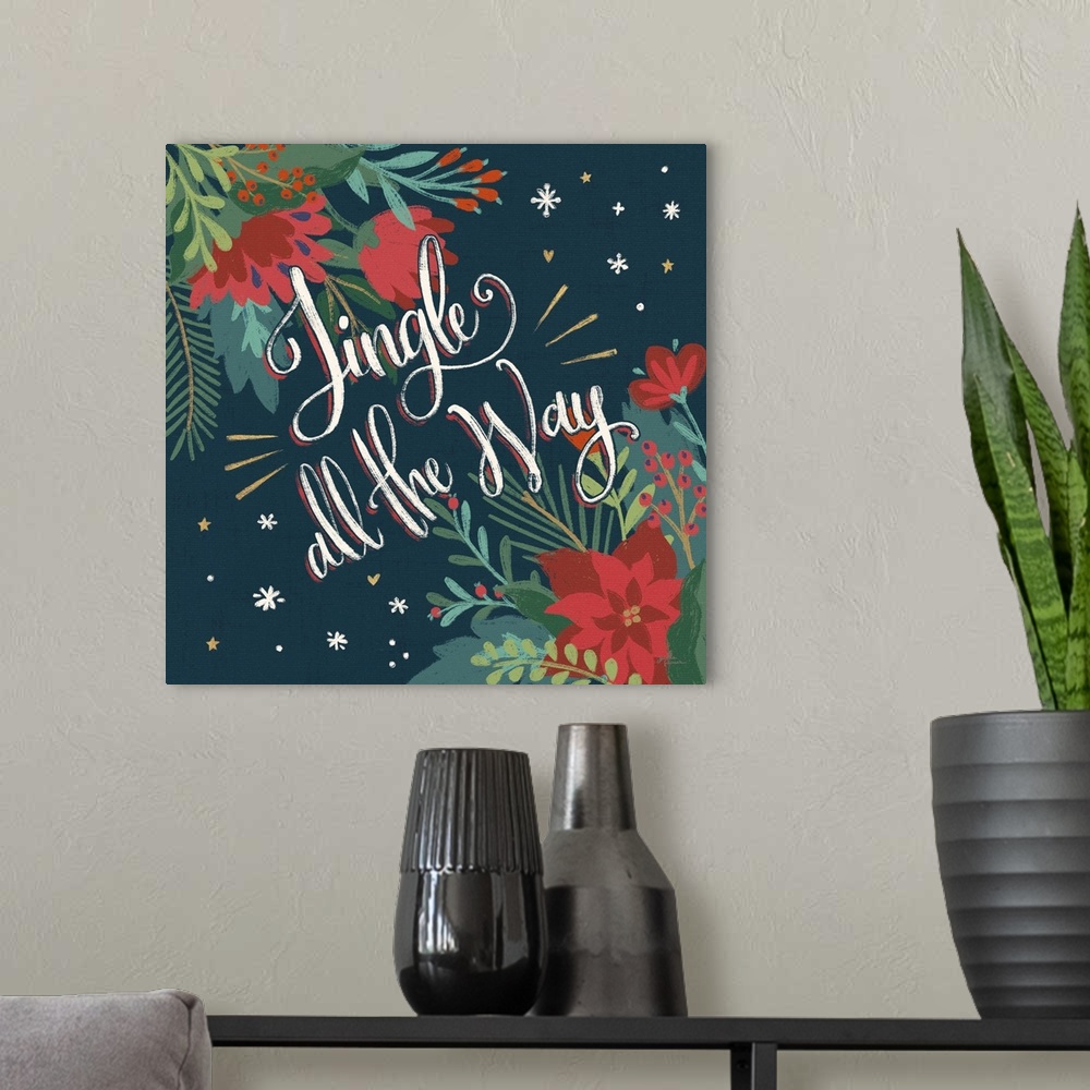 A modern room featuring Decorative artwork of red flowers and leaves with the text "Jingle all the Way" on a dark navy ba...