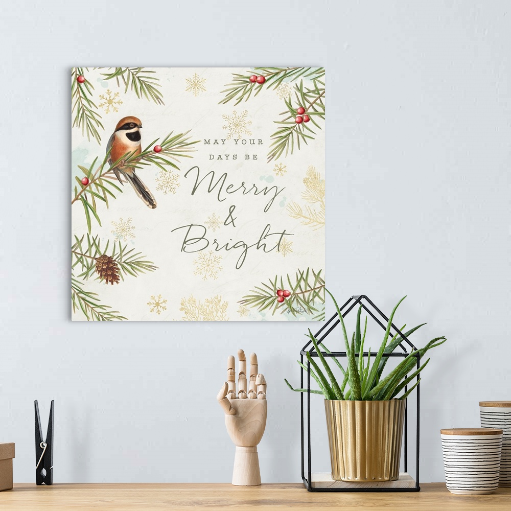 A bohemian room featuring A square holiday design of a bird perched on a pine branch with the text "May your Days Be Merry ...
