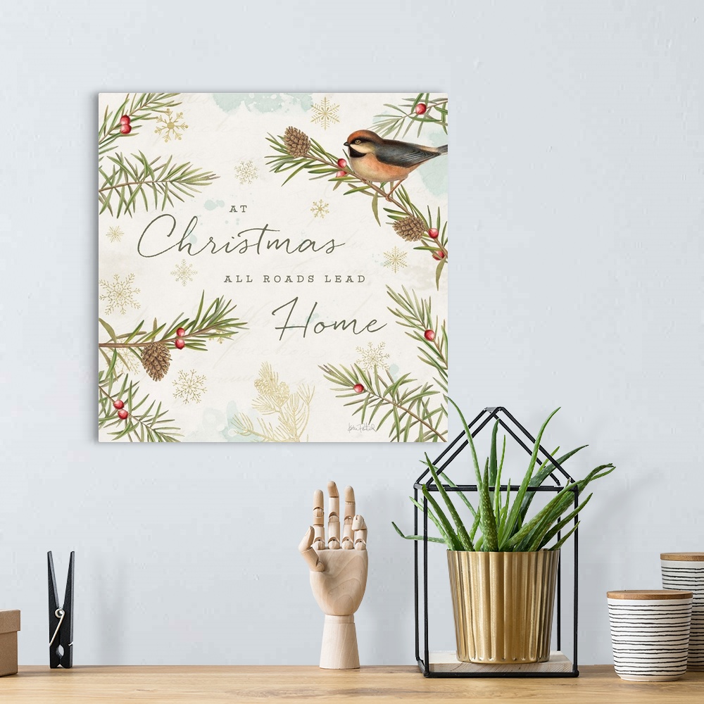 A bohemian room featuring A square holiday design of a bird perched on a pine branch with the text "At Christmas All Roads ...