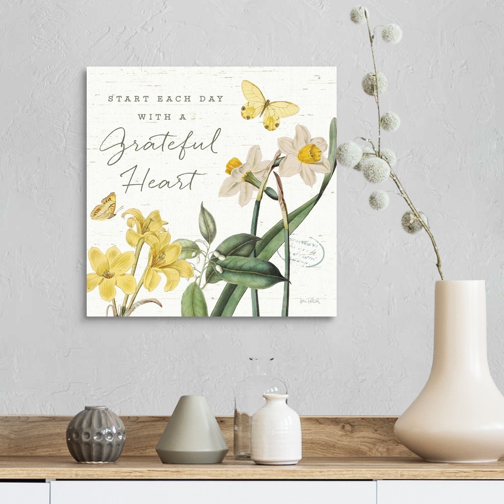 A farmhouse room featuring Square decor in white, yellow, and green with illustrations of butterflies and flowers on a white...