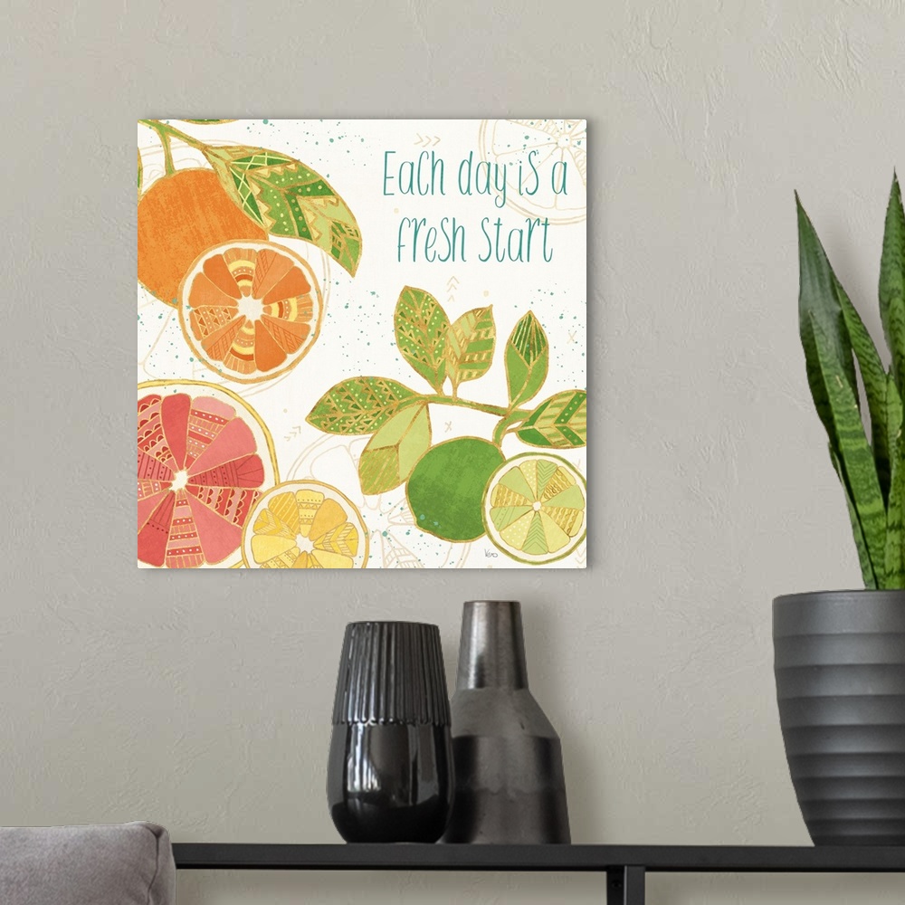 A modern room featuring Decorative colorful artwork of sliced fruits with geometric designs and the phrase, 'Each day is ...