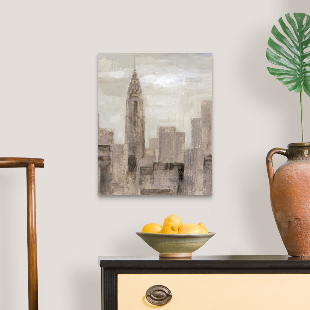 A traditional room featuring Neutral toned abstract painting of the New York City skyline with the Chrysler Building.