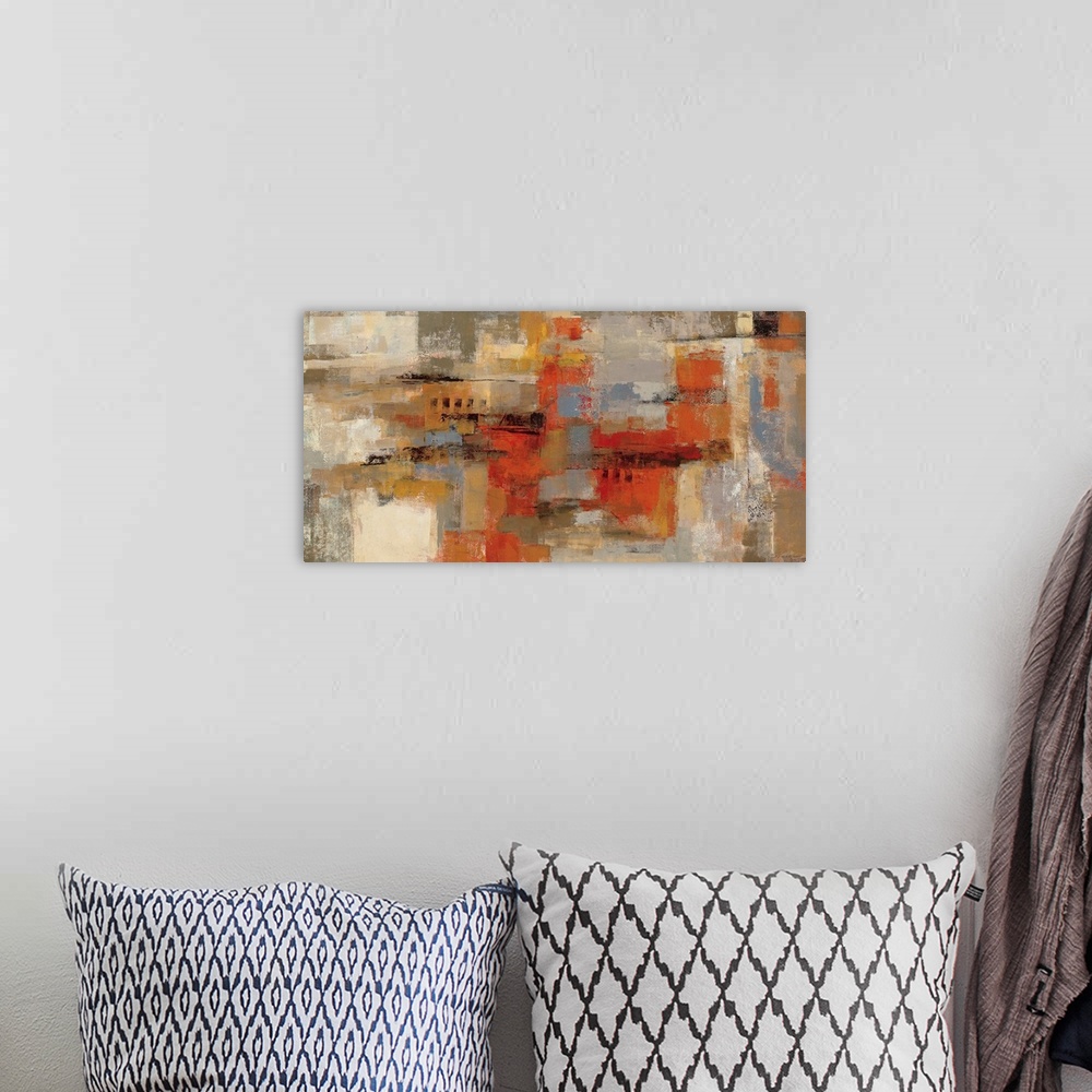 A bohemian room featuring Large abstract art composed of different square and rectangular sized patches of earth tones sitt...