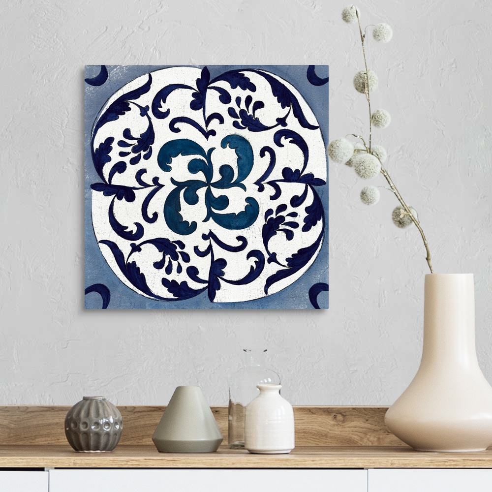 A farmhouse room featuring Square abstract painting of a symmetric indigo and white tile-like design.