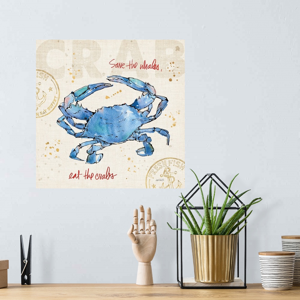 A bohemian room featuring "Save the Whales, Eat the Crabs" written in red with a watercolor painting of a blue crab on a bu...
