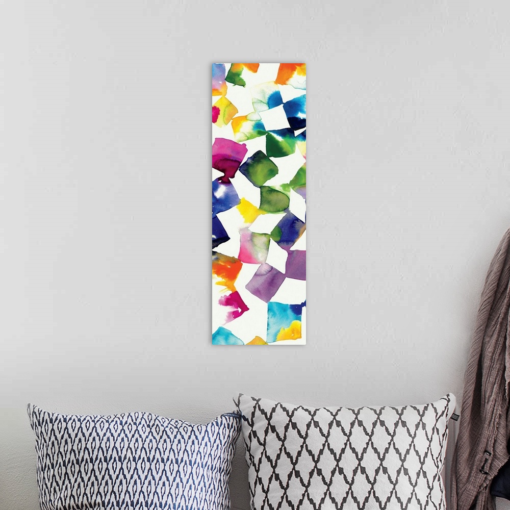 A bohemian room featuring Colorful abstract artwork of square shapes in bright rainbow colors.