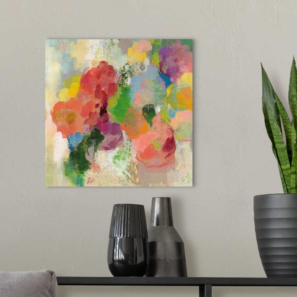 A modern room featuring Contemporary artwork of a rainbow of flowers in bloom.