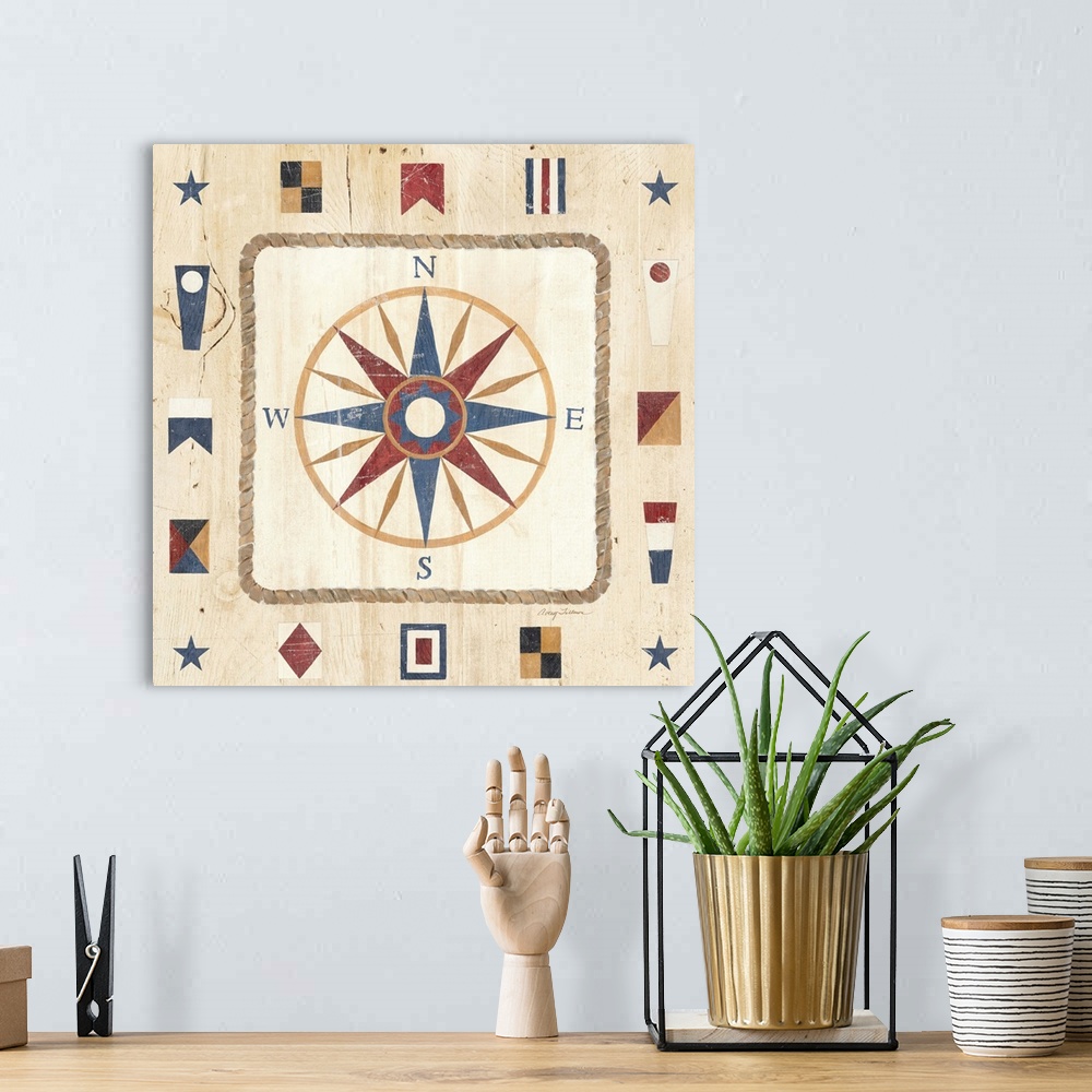 A bohemian room featuring Contemporary artwork of a compass, surrounded by nautical signal flags