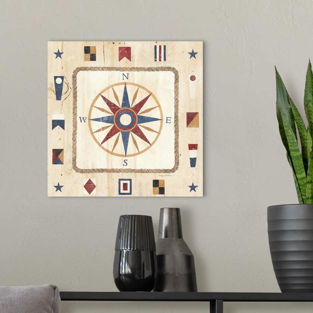 A modern room featuring Contemporary artwork of a compass, surrounded by nautical signal flags