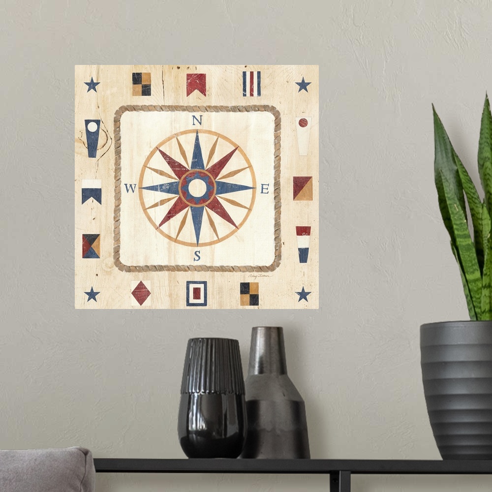 A modern room featuring Contemporary artwork of a compass, surrounded by nautical signal flags