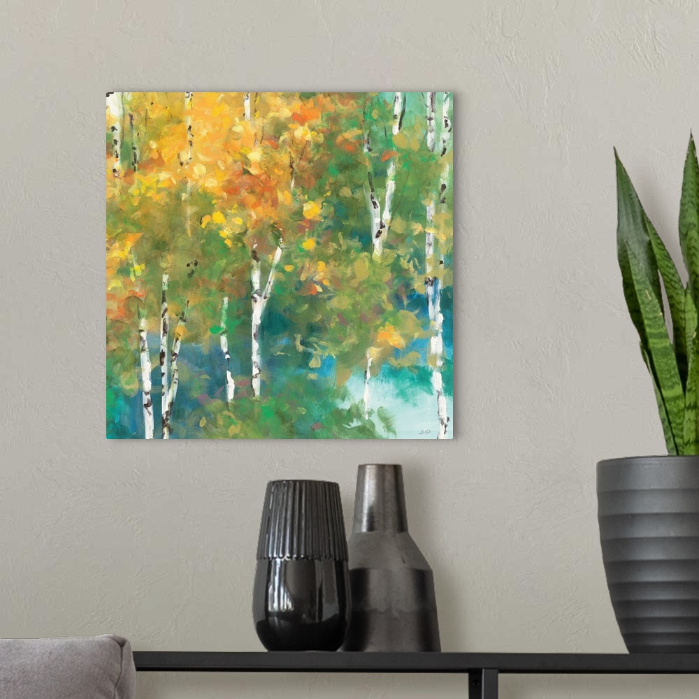 A modern room featuring Contemporary artwork of a forest of thin birch trees turning fall colors.